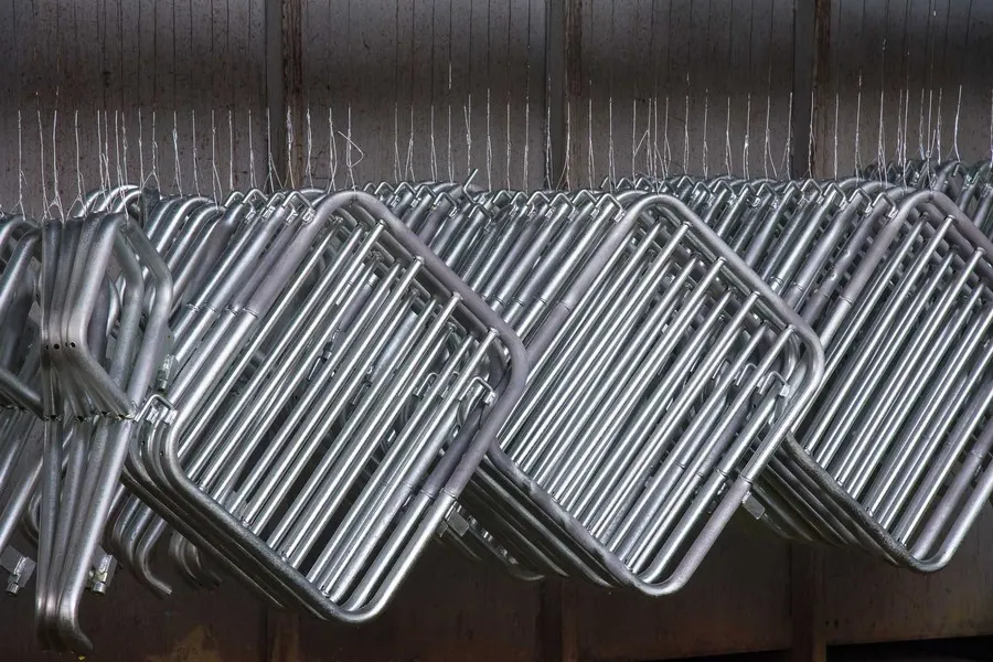 Domestic fence fittings on a steel fence line
